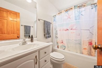 Don't miss out on this incredible canal-front home situated on on Duck Woods Country Club in North Carolina - for sale on GolfHomes.com, golf home, golf lot