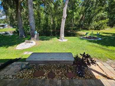 This meticulously cared-for home is as beautiful inside as it is on Big Cypress Golf and Country Club in Florida - for sale on GolfHomes.com, golf home, golf lot