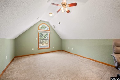 Don't miss out on this incredible canal-front home situated on on Duck Woods Country Club in North Carolina - for sale on GolfHomes.com, golf home, golf lot
