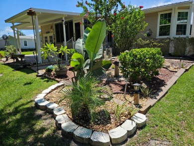 This meticulously cared-for home is as beautiful inside as it is on Big Cypress Golf and Country Club in Florida - for sale on GolfHomes.com, golf home, golf lot