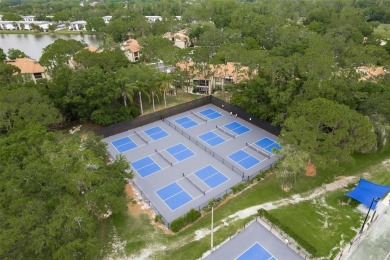 Welcome to this beautiful 4 bed 3 bath home located on the third on East Lake Woodlands Country Club in Florida - for sale on GolfHomes.com, golf home, golf lot