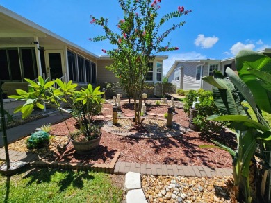 This meticulously cared-for home is as beautiful inside as it is on Big Cypress Golf and Country Club in Florida - for sale on GolfHomes.com, golf home, golf lot