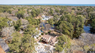 Don't miss out on this incredible canal-front home situated on on Duck Woods Country Club in North Carolina - for sale on GolfHomes.com, golf home, golf lot