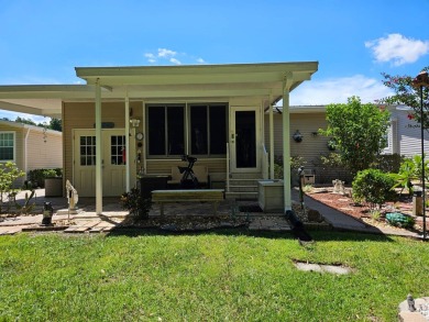 This meticulously cared-for home is as beautiful inside as it is on Big Cypress Golf and Country Club in Florida - for sale on GolfHomes.com, golf home, golf lot
