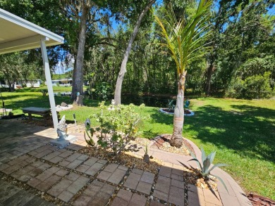 This meticulously cared-for home is as beautiful inside as it is on Big Cypress Golf and Country Club in Florida - for sale on GolfHomes.com, golf home, golf lot