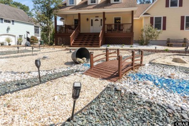 Don't miss out on this incredible canal-front home situated on on Duck Woods Country Club in North Carolina - for sale on GolfHomes.com, golf home, golf lot