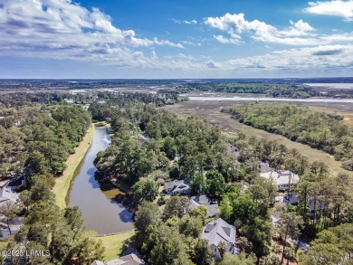 Discover the perfect blend of Southern charm and modern comfort on Dataw Island Club in South Carolina - for sale on GolfHomes.com, golf home, golf lot