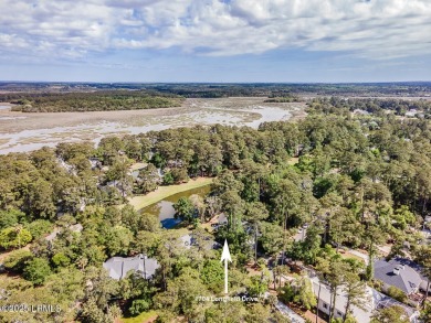 Discover the perfect blend of Southern charm and modern comfort on Dataw Island Club in South Carolina - for sale on GolfHomes.com, golf home, golf lot