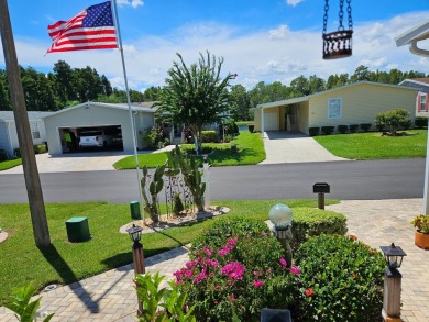 This meticulously cared-for home is as beautiful inside as it is on Big Cypress Golf and Country Club in Florida - for sale on GolfHomes.com, golf home, golf lot