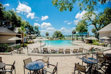 Discover the perfect blend of Southern charm and modern comfort on Dataw Island Club in South Carolina - for sale on GolfHomes.com, golf home, golf lot