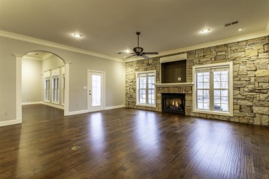 Stunning all-brick, single-level home in Ridgepointe overlooking on RidgePointe Country Club in Arkansas - for sale on GolfHomes.com, golf home, golf lot