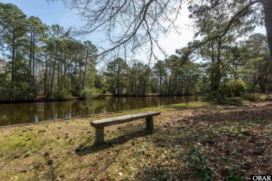 Don't miss out on this incredible canal-front home situated on on Duck Woods Country Club in North Carolina - for sale on GolfHomes.com, golf home, golf lot