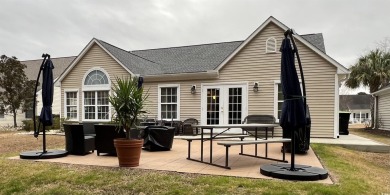Have the best of both worlds, this spectacular home that has on Sandpiper Bay Golf and Country Club in North Carolina - for sale on GolfHomes.com, golf home, golf lot