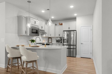 Welcome to effortless coastal living in the highly sought-after on Myrtlewood Golf Course and Club  in South Carolina - for sale on GolfHomes.com, golf home, golf lot