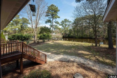 Don't miss out on this incredible canal-front home situated on on Duck Woods Country Club in North Carolina - for sale on GolfHomes.com, golf home, golf lot