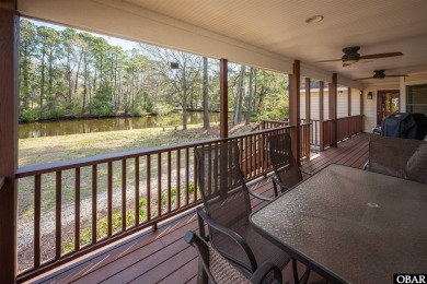 Don't miss out on this incredible canal-front home situated on on Duck Woods Country Club in North Carolina - for sale on GolfHomes.com, golf home, golf lot