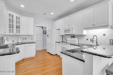 PRICE IMPROVEMENT! Nestled in a tranquil neighborhood, this on Carolina National Golf Club in North Carolina - for sale on GolfHomes.com, golf home, golf lot