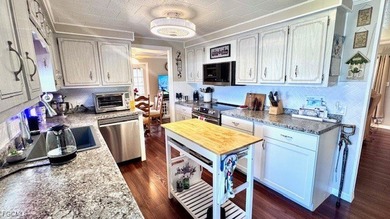 Welcome to your dream waterfront home in the premier 55+ gated on Riverbend Golf and Country Club in Florida - for sale on GolfHomes.com, golf home, golf lot