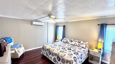 Welcome to your dream waterfront home in the premier 55+ gated on Riverbend Golf and Country Club in Florida - for sale on GolfHomes.com, golf home, golf lot