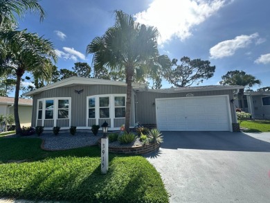 A beautiful remodeled home done in 2022! As you arrive at the on Del Tura Golf and Country Club in Florida - for sale on GolfHomes.com, golf home, golf lot