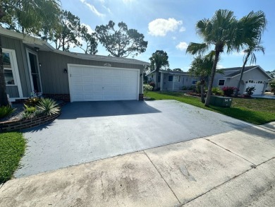 A beautiful remodeled home done in 2022! As you arrive at the on Del Tura Golf and Country Club in Florida - for sale on GolfHomes.com, golf home, golf lot