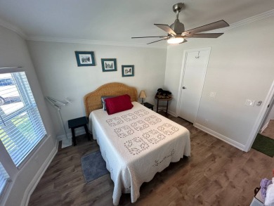 A beautiful remodeled home done in 2022! As you arrive at the on Del Tura Golf and Country Club in Florida - for sale on GolfHomes.com, golf home, golf lot