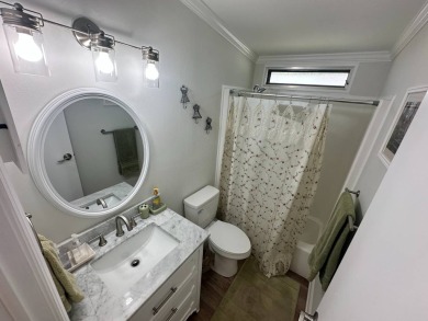 A beautiful remodeled home done in 2022! As you arrive at the on Del Tura Golf and Country Club in Florida - for sale on GolfHomes.com, golf home, golf lot
