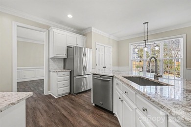 Updated 5-bedroom, 2.5-bath home located in the Highland Creek on Highland Creek Golf Club in North Carolina - for sale on GolfHomes.com, golf home, golf lot