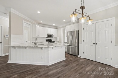 Updated 5-bedroom, 2.5-bath home located in the Highland Creek on Highland Creek Golf Club in North Carolina - for sale on GolfHomes.com, golf home, golf lot