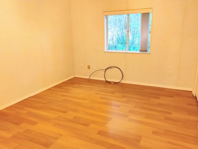 Over 1200 sq. ft. of comfortable living with a 1 car garage on Ocala Palms Golf and Country Club in Florida - for sale on GolfHomes.com, golf home, golf lot