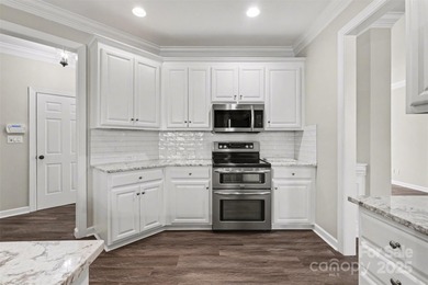 Updated 5-bedroom, 2.5-bath home located in the Highland Creek on Highland Creek Golf Club in North Carolina - for sale on GolfHomes.com, golf home, golf lot