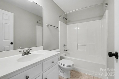 Updated 5-bedroom, 2.5-bath home located in the Highland Creek on Highland Creek Golf Club in North Carolina - for sale on GolfHomes.com, golf home, golf lot