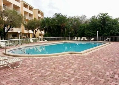 Discover serenity on this first floor lake view apartment on Fontainebleau Golf Course in Florida - for sale on GolfHomes.com, golf home, golf lot