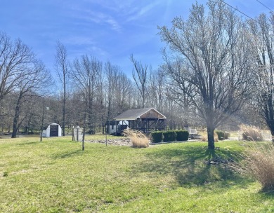 Feel like you're on vacation every day, in this amazing location on Perry Park Golf Resort in Kentucky - for sale on GolfHomes.com, golf home, golf lot