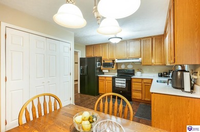 This inviting 3-bedroom, 2-bath ranch home is nestled among on Doe Valley Country Club in Kentucky - for sale on GolfHomes.com, golf home, golf lot