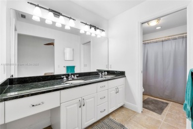 Discover Paradise. A well updated home, perfectly situated in on  in Florida - for sale on GolfHomes.com, golf home, golf lot