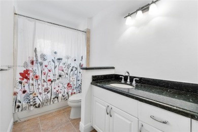 Discover Paradise. A well updated home, perfectly situated in on  in Florida - for sale on GolfHomes.com, golf home, golf lot