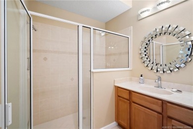 This beautifully maintained 3-bedroom, 2-bath villa with a 2-car on Eagle Marsh Golf Club in Florida - for sale on GolfHomes.com, golf home, golf lot