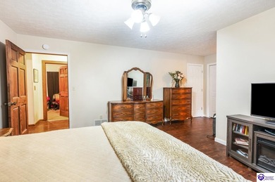 This inviting 3-bedroom, 2-bath ranch home is nestled among on Doe Valley Country Club in Kentucky - for sale on GolfHomes.com, golf home, golf lot