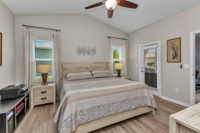Welcome home to this INCREDIBLY WELL MAINTAINED and FEELS LIKE on Kings Gate Golf Club in Florida - for sale on GolfHomes.com, golf home, golf lot