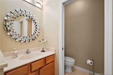 This beautifully maintained 3-bedroom, 2-bath villa with a 2-car on Eagle Marsh Golf Club in Florida - for sale on GolfHomes.com, golf home, golf lot