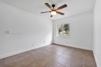Discover Paradise. A well updated home, perfectly situated in on  in Florida - for sale on GolfHomes.com, golf home, golf lot