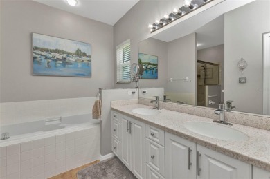 Welcome home to this INCREDIBLY WELL MAINTAINED and FEELS LIKE on Kings Gate Golf Club in Florida - for sale on GolfHomes.com, golf home, golf lot