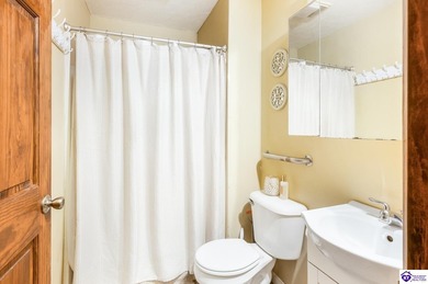 This inviting 3-bedroom, 2-bath ranch home is nestled among on Doe Valley Country Club in Kentucky - for sale on GolfHomes.com, golf home, golf lot