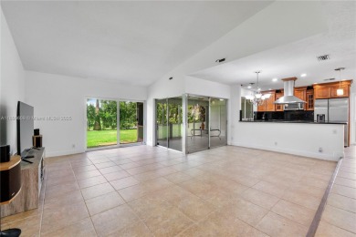 Discover Paradise. A well updated home, perfectly situated in on  in Florida - for sale on GolfHomes.com, golf home, golf lot
