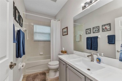 Welcome home to this INCREDIBLY WELL MAINTAINED and FEELS LIKE on Kings Gate Golf Club in Florida - for sale on GolfHomes.com, golf home, golf lot