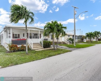 BEAUTIFUL manufactured home in Ravenswood Estates where you own on The Club at Emerald Hills in Florida - for sale on GolfHomes.com, golf home, golf lot