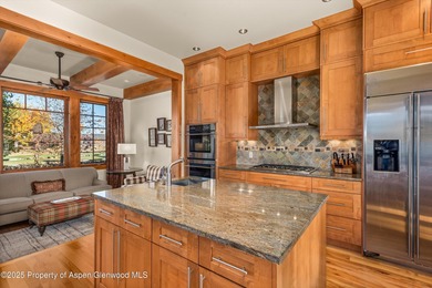 Spacious custom home on the 12th fairway/tee in River Valley on River Valley Ranch Golf Club in Colorado - for sale on GolfHomes.com, golf home, golf lot