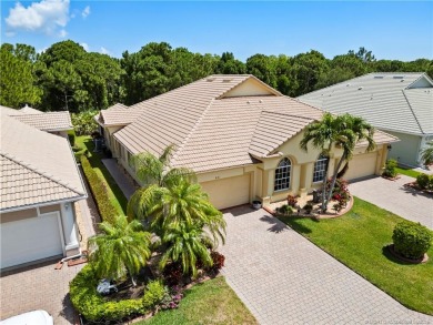 This beautifully maintained 3-bedroom, 2-bath villa with a 2-car on Eagle Marsh Golf Club in Florida - for sale on GolfHomes.com, golf home, golf lot