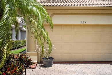 This beautifully maintained 3-bedroom, 2-bath villa with a 2-car on Eagle Marsh Golf Club in Florida - for sale on GolfHomes.com, golf home, golf lot